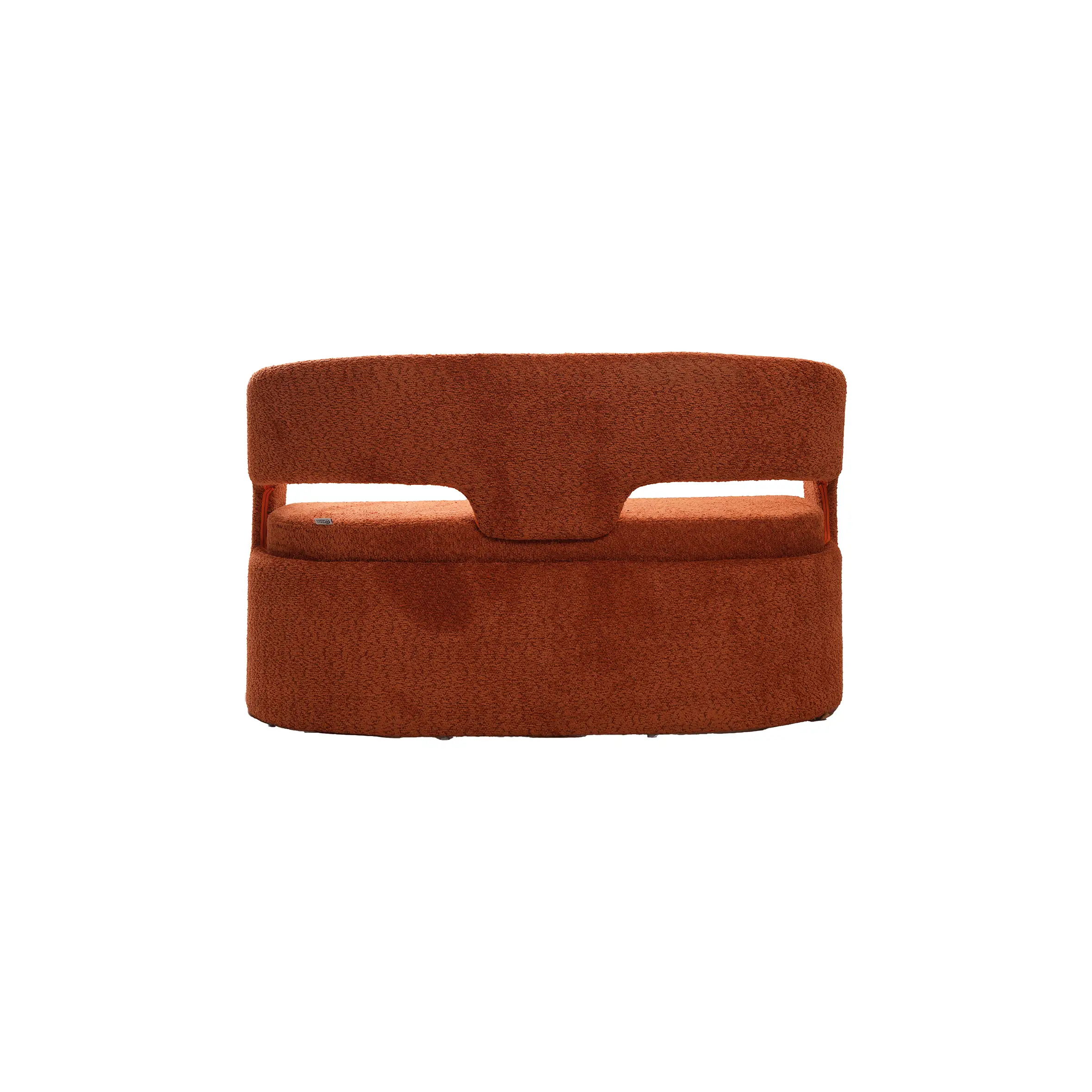 Modern interior with a sleek marble reception desk on the left, a round black side table, and a rust-colored sofa on the right. Minimalist and calm.