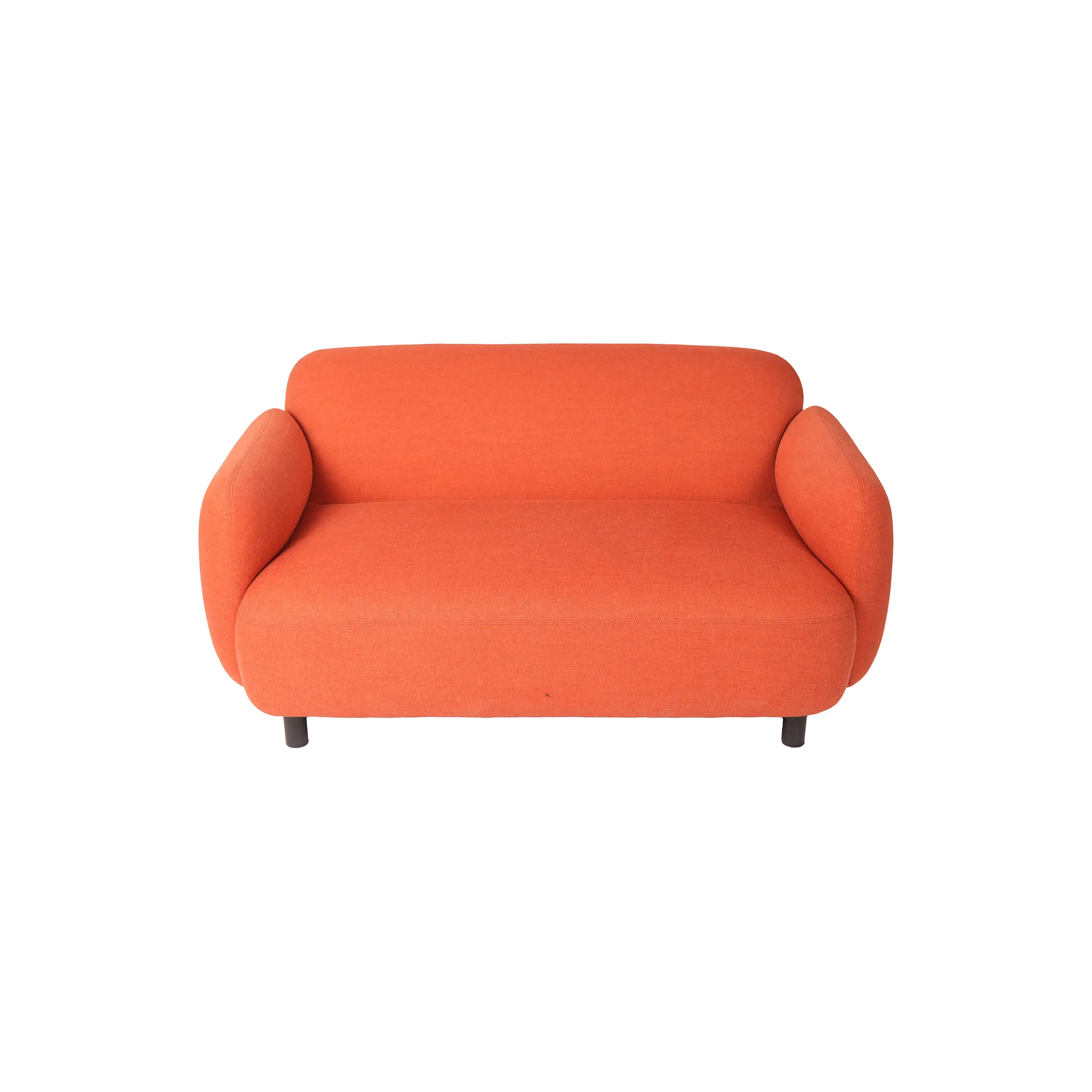 Modern rooftop lounge with an orange sofa and circular black table. Surrounded by tall windows, gray columns, and green plants. Bright and airy ambiance.