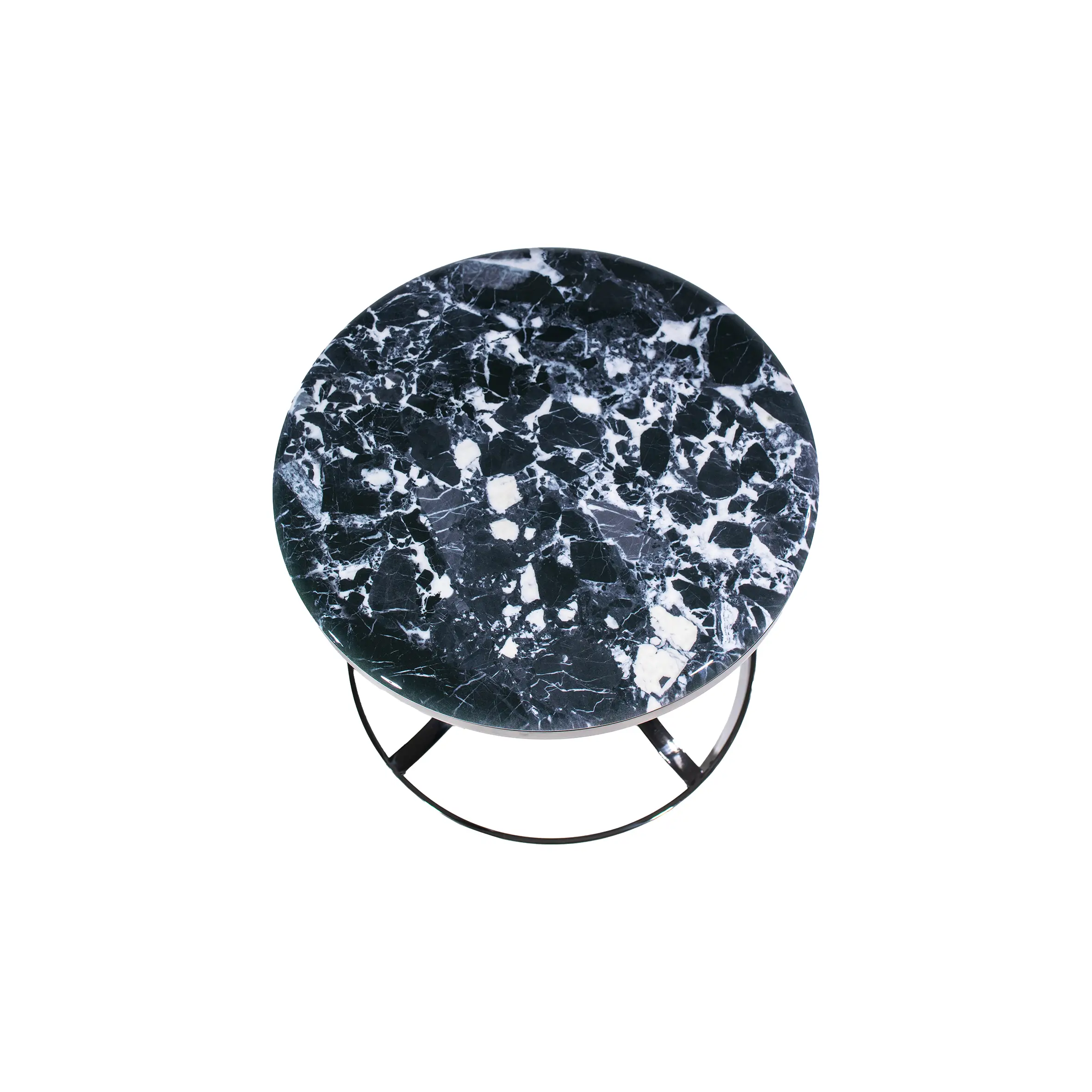 Modern office lounge featuring a sleek black sofa and a stylish round side table with a metallic frame on a textured gray carpet, conveying sophistication.