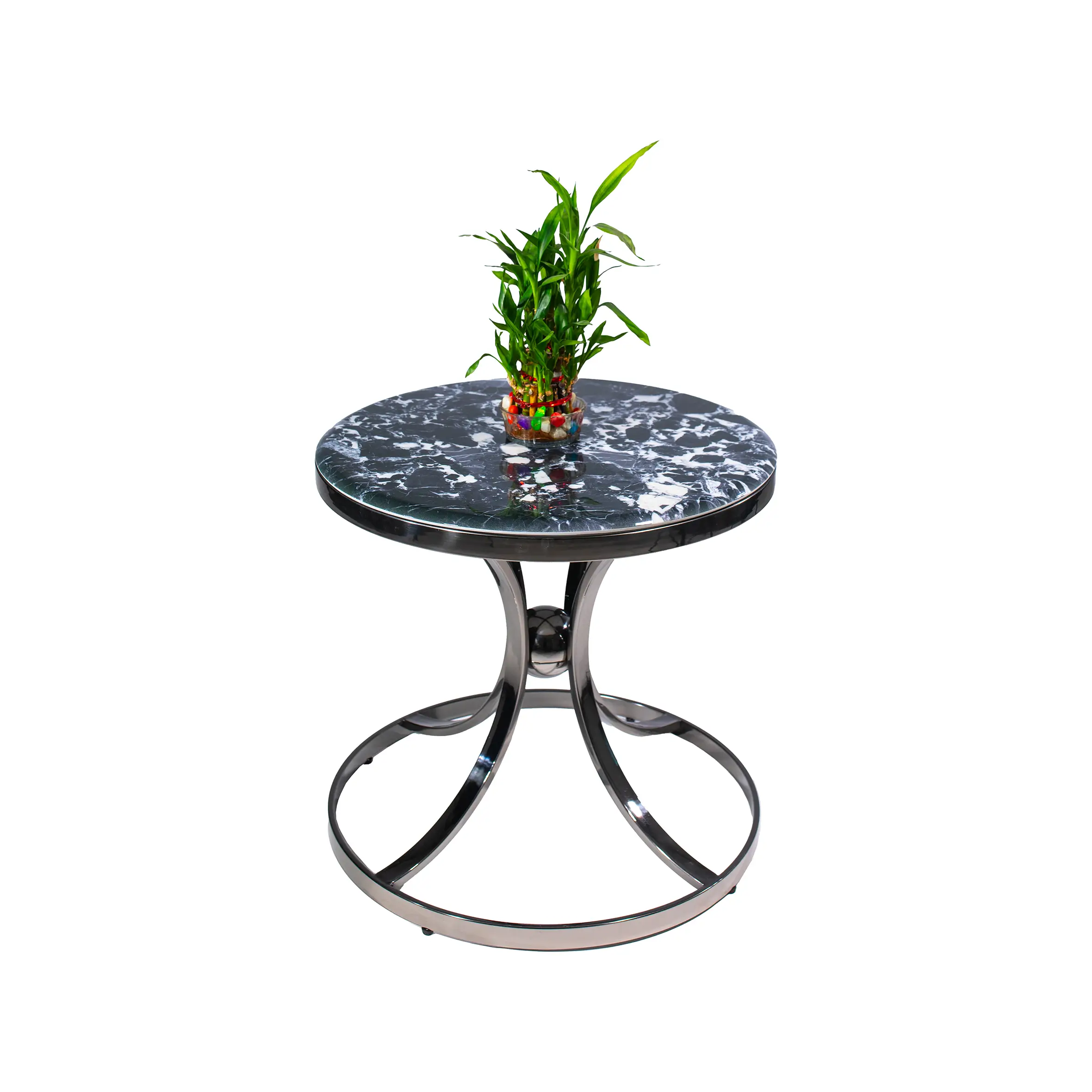 Modern office lounge featuring a sleek black sofa and a stylish round side table with a metallic frame on a textured gray carpet, conveying sophistication.