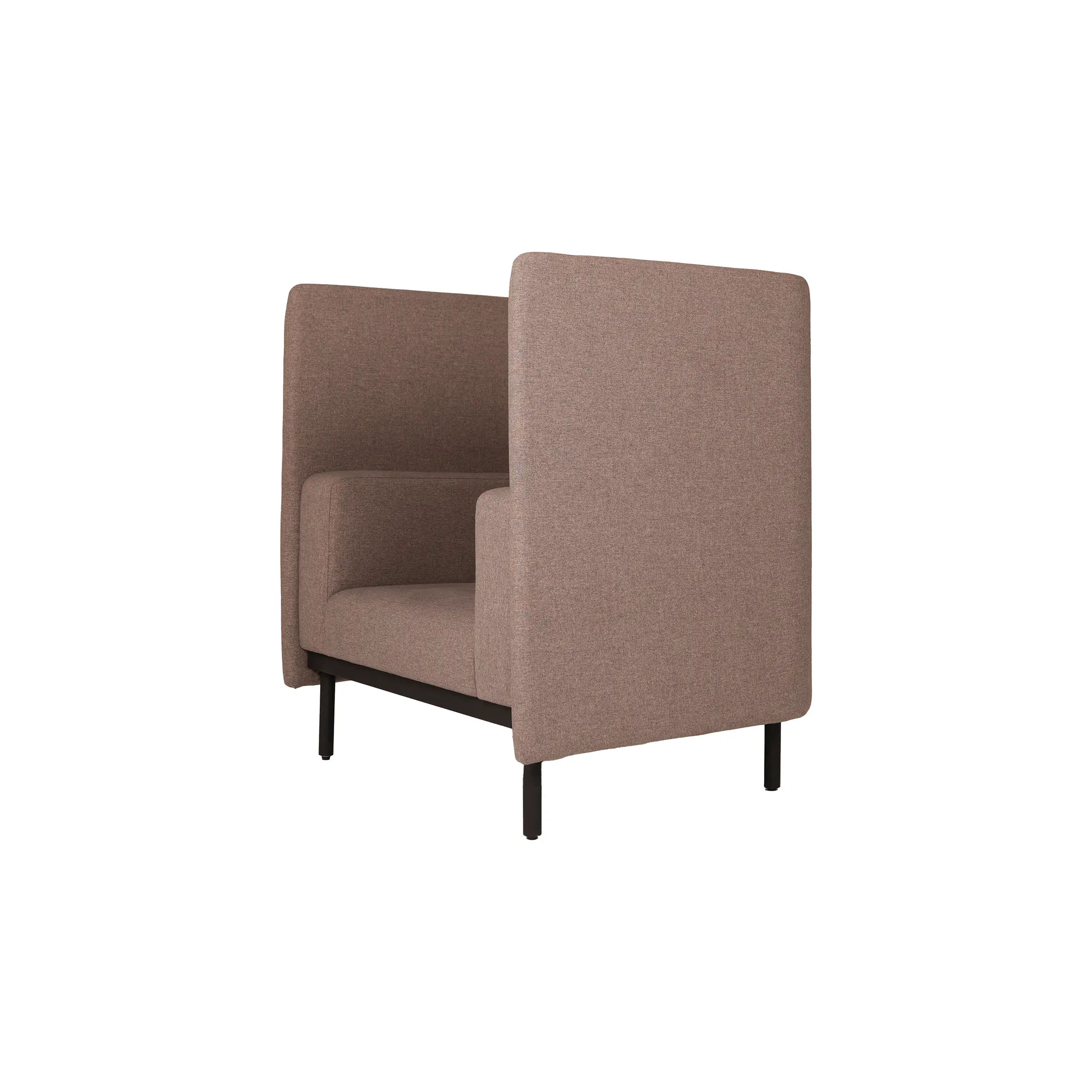 A modern grey armchair with high sides stands beside a small wooden side table on a beige carpet, set against a frosted glass and metal-paneled wall.