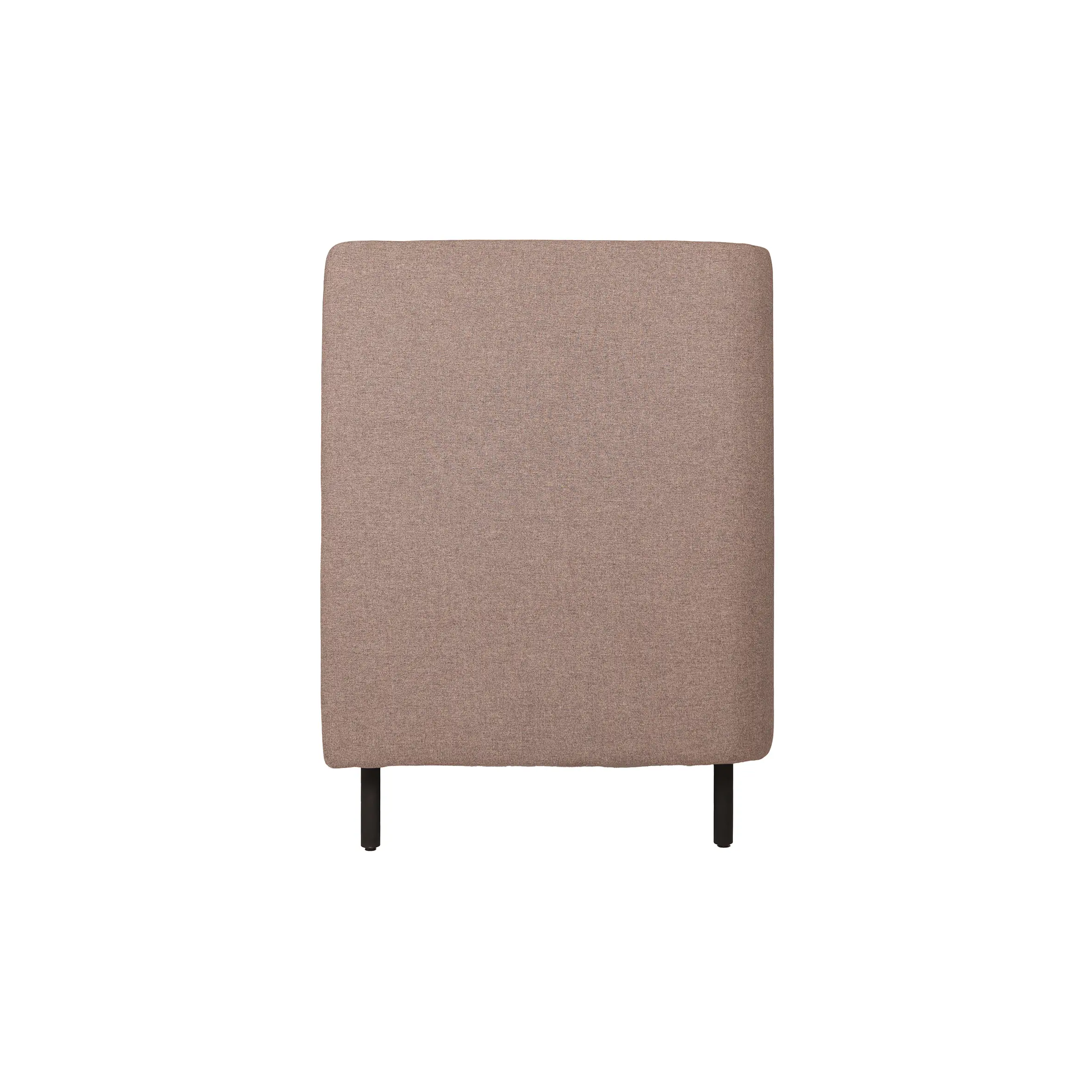 A modern grey armchair with high sides stands beside a small wooden side table on a beige carpet, set against a frosted glass and metal-paneled wall.