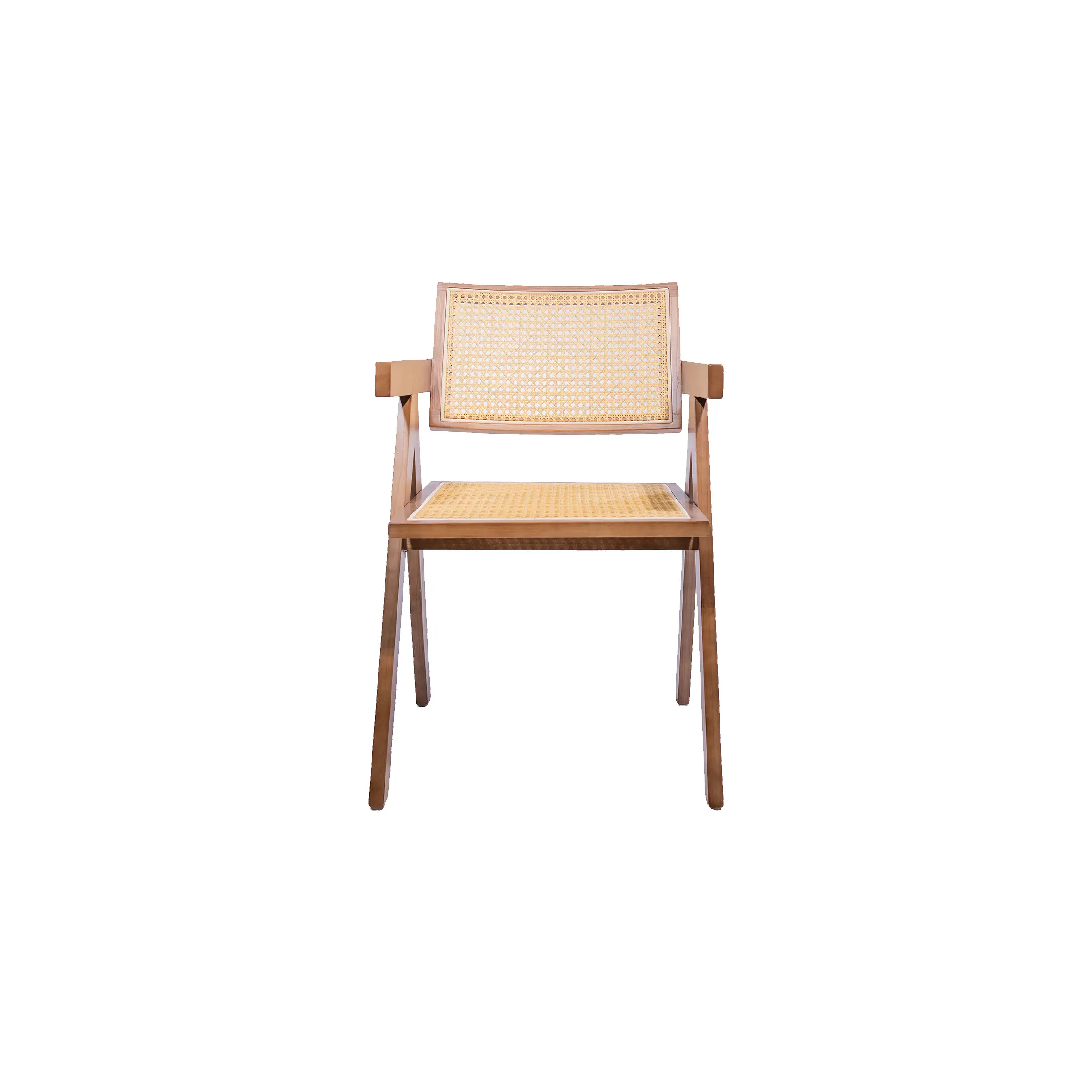 Sleek modern lobby with a wooden table and four chairs. Soft ceiling lights create a warm, inviting atmosphere. Large glass windows showcase green trees outside.