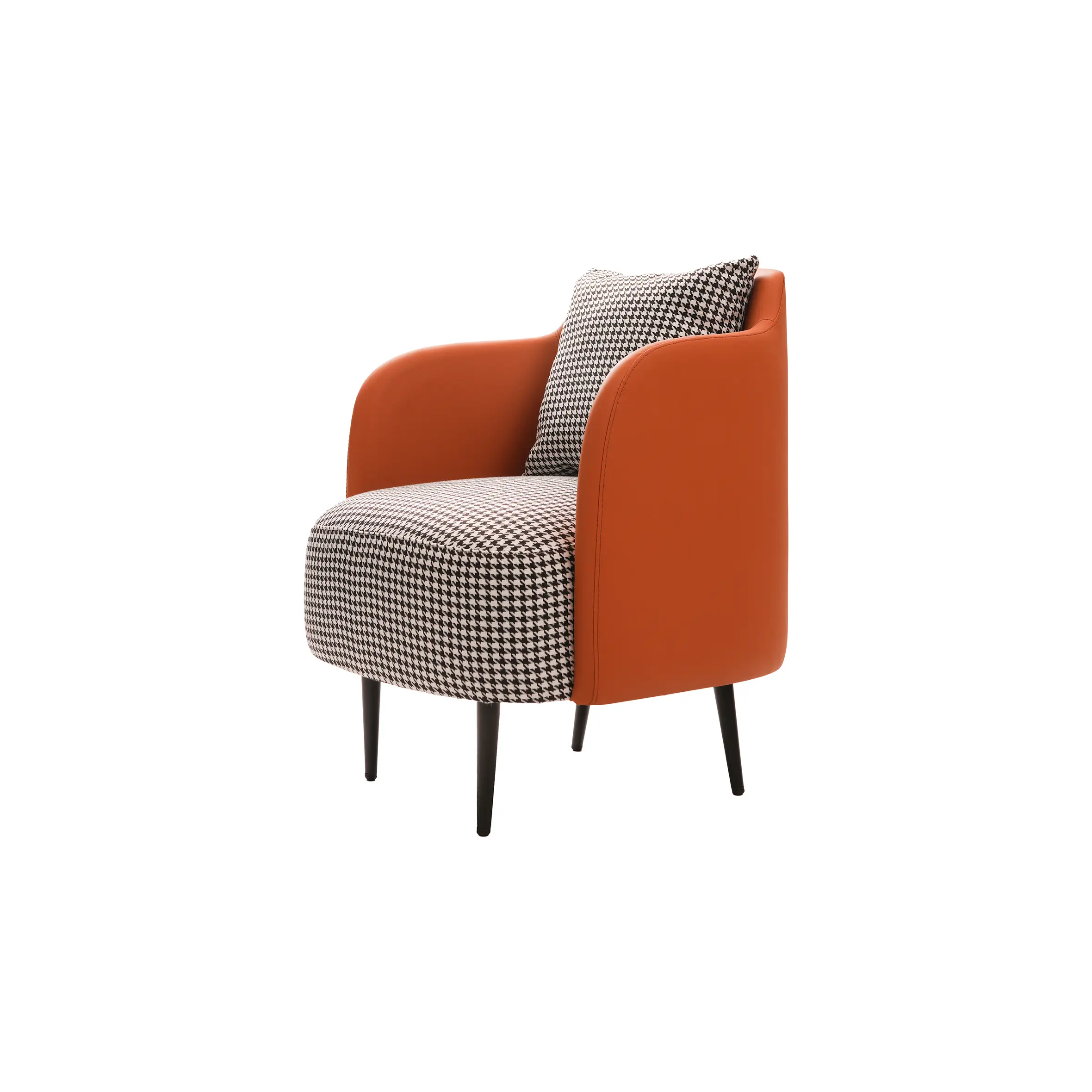 Minimalist office with a white desk, computer, black chair, and black binders. Orange and houndstooth armchair adds a pop of color, exuding modern elegance.