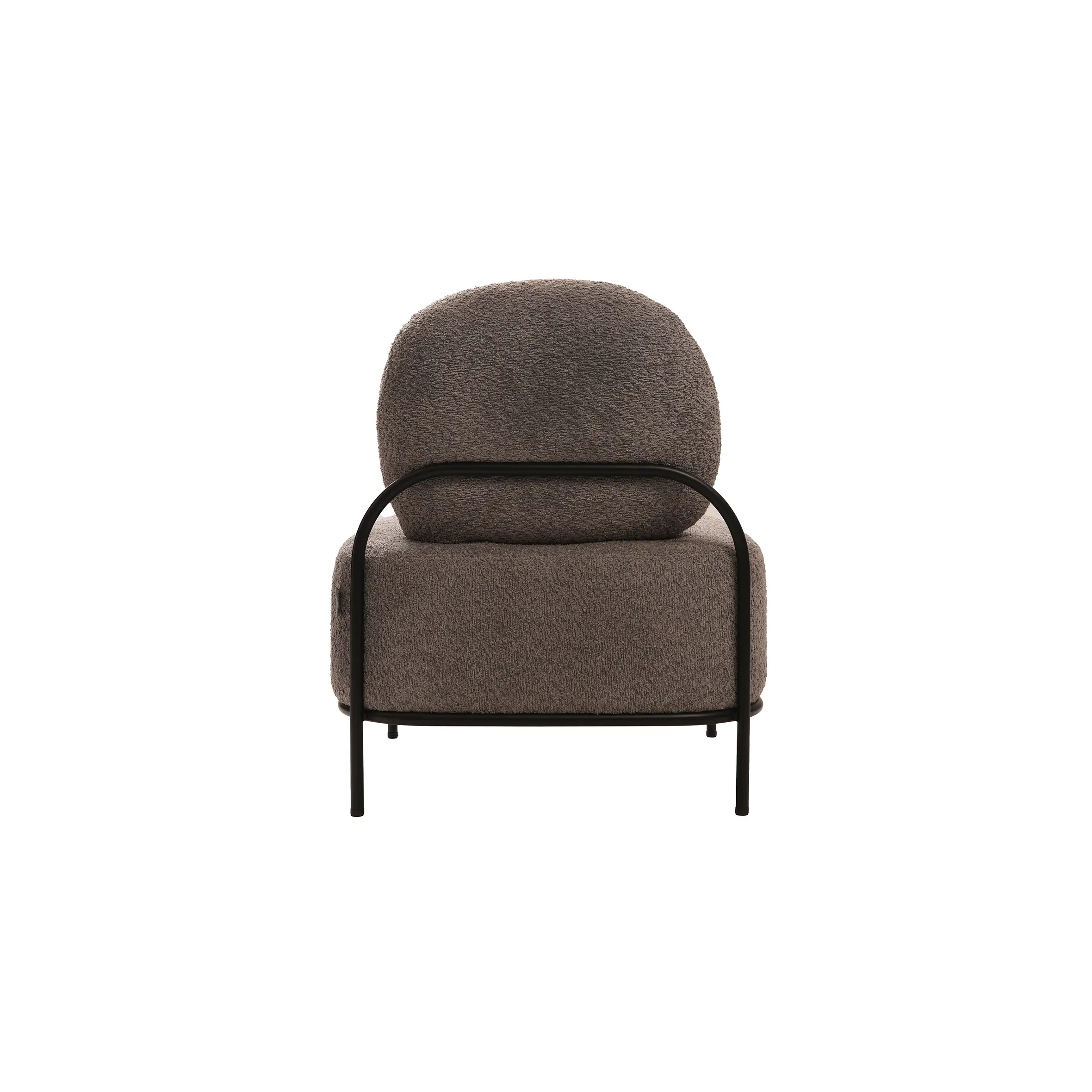 Modern lounge scene with a brown cushioned sofa beside a sleek, black marble-topped table on a light tile floor. Warm wood paneling adds coziness.