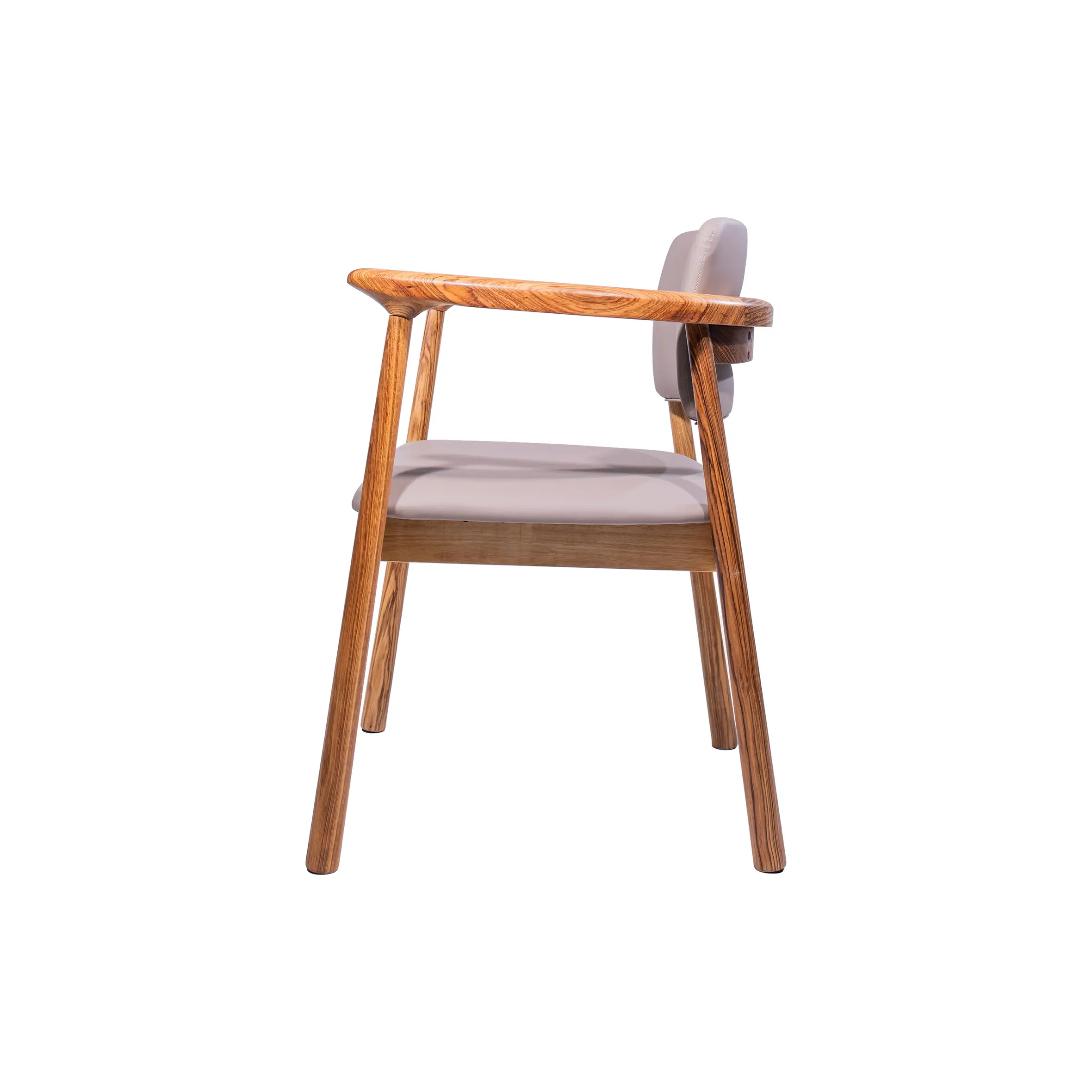 A minimalist waiting room with two wooden chairs, a small table between them, and a potted plant. The atmosphere is calm and inviting, featuring soft lighting.