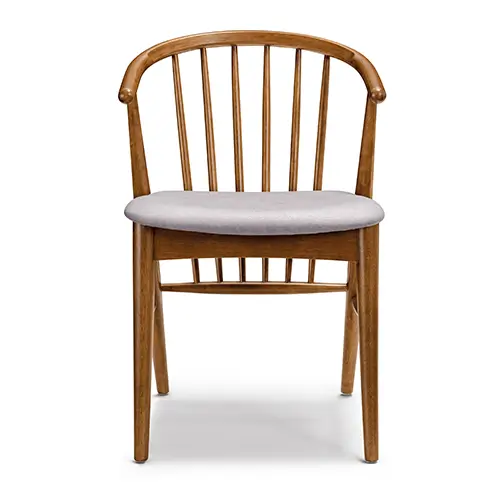 Spacious modern lobby with round marble table and wooden chairs. Curved ceiling lights and large windows create an elegant and inviting atmosphere.