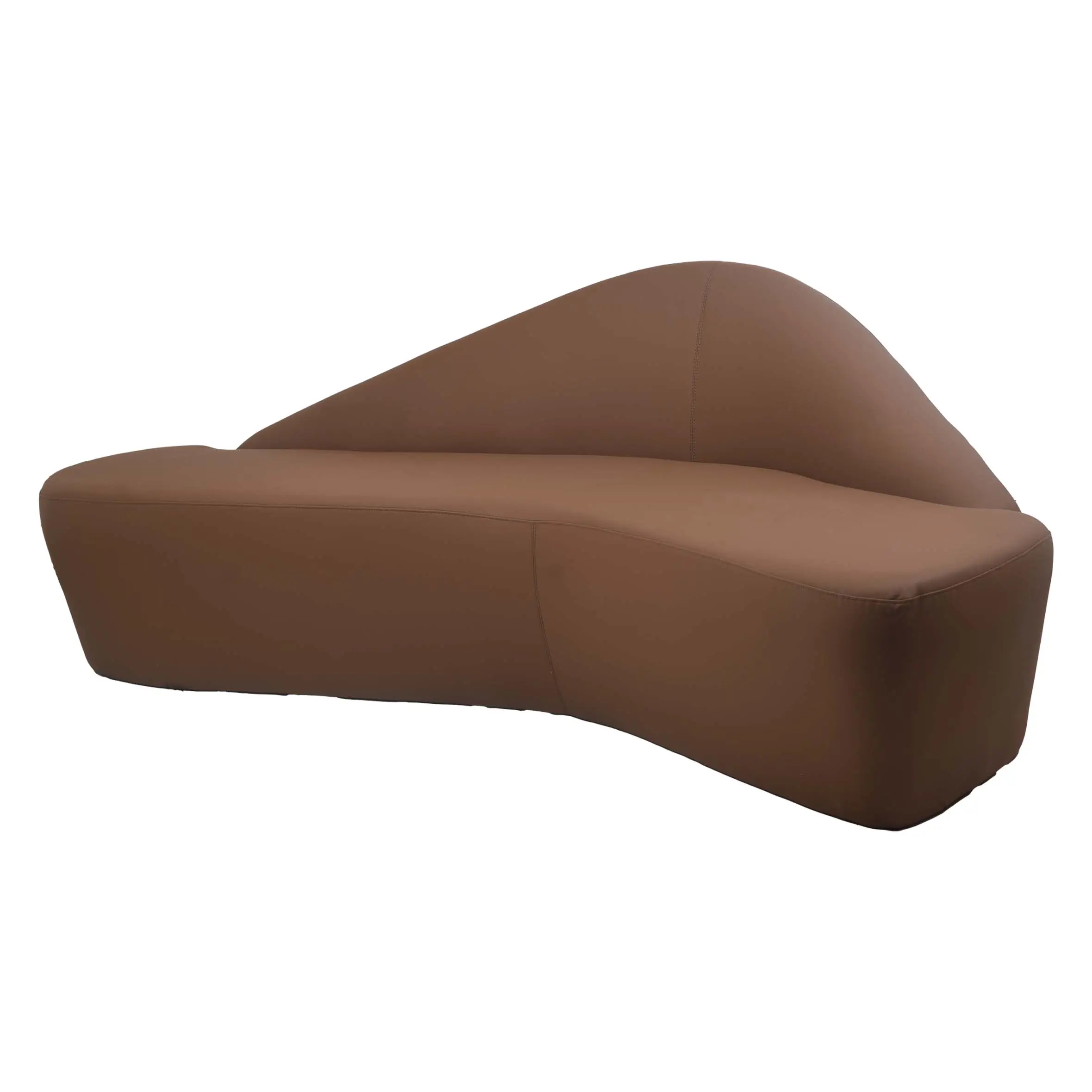 Contemporary living room with a brown, sculptural sofa, beige textured rug, and lush green plants. Light filters through sheer white curtains.