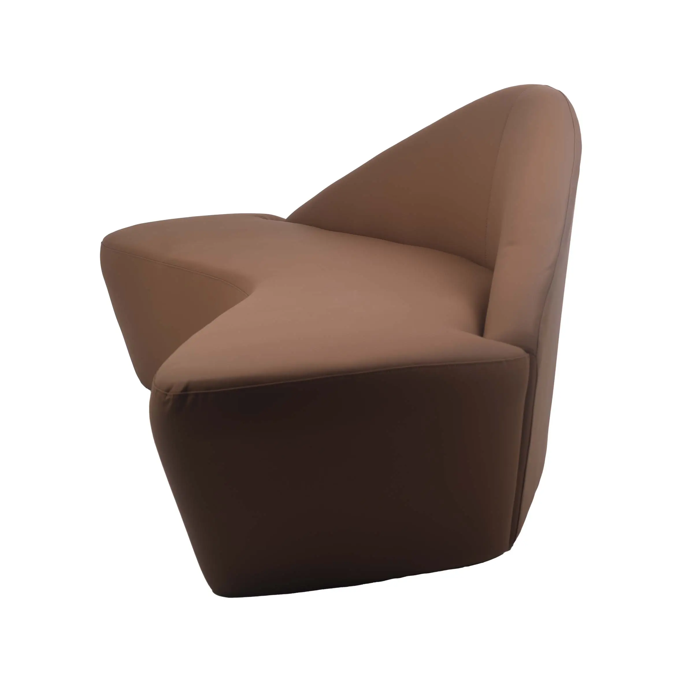 Contemporary living room with a brown, sculptural sofa, beige textured rug, and lush green plants. Light filters through sheer white curtains.