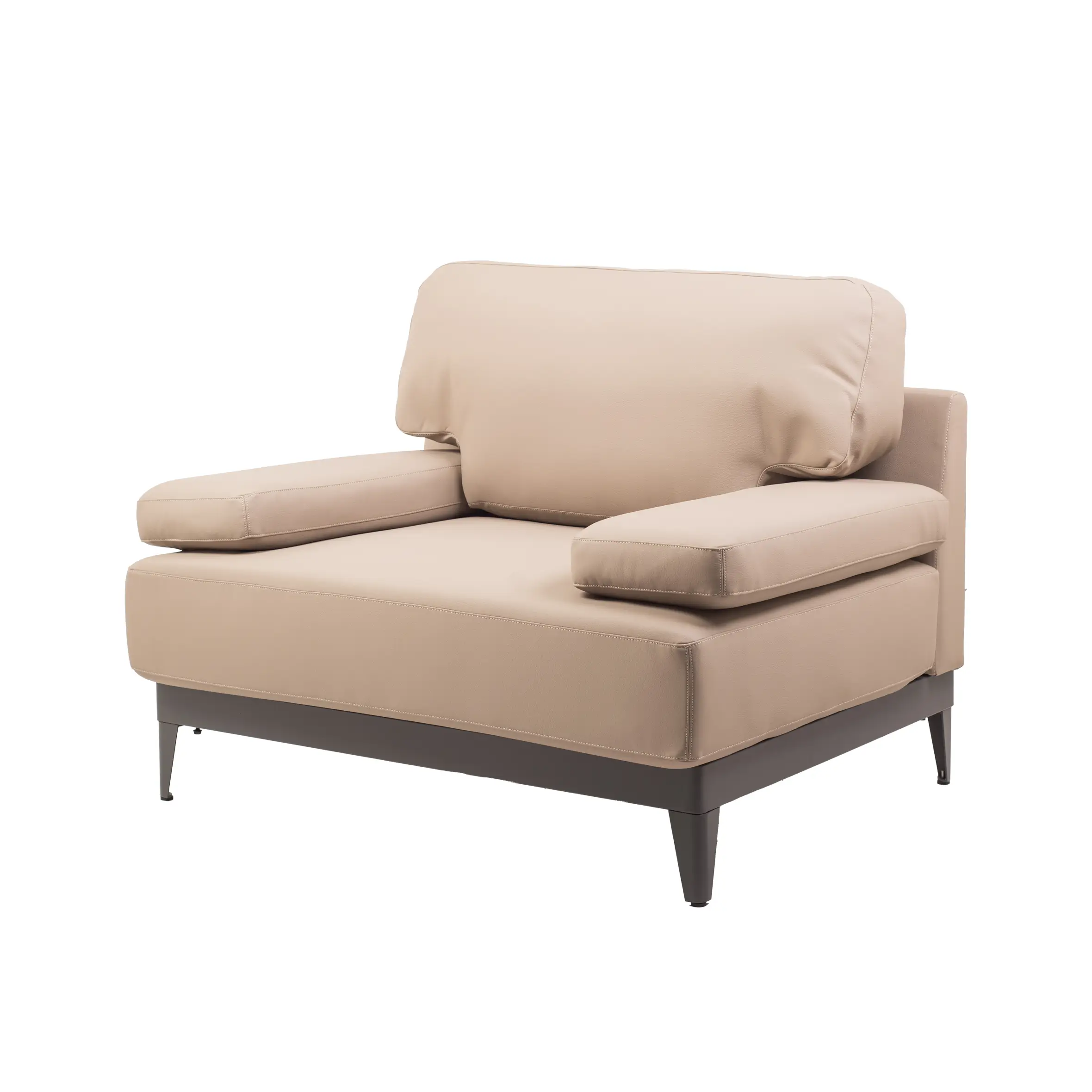 A spacious, modern office with large windows, gray carpet, and soft lighting. A beige sofa is central, surrounded by desks, chairs, and plants.