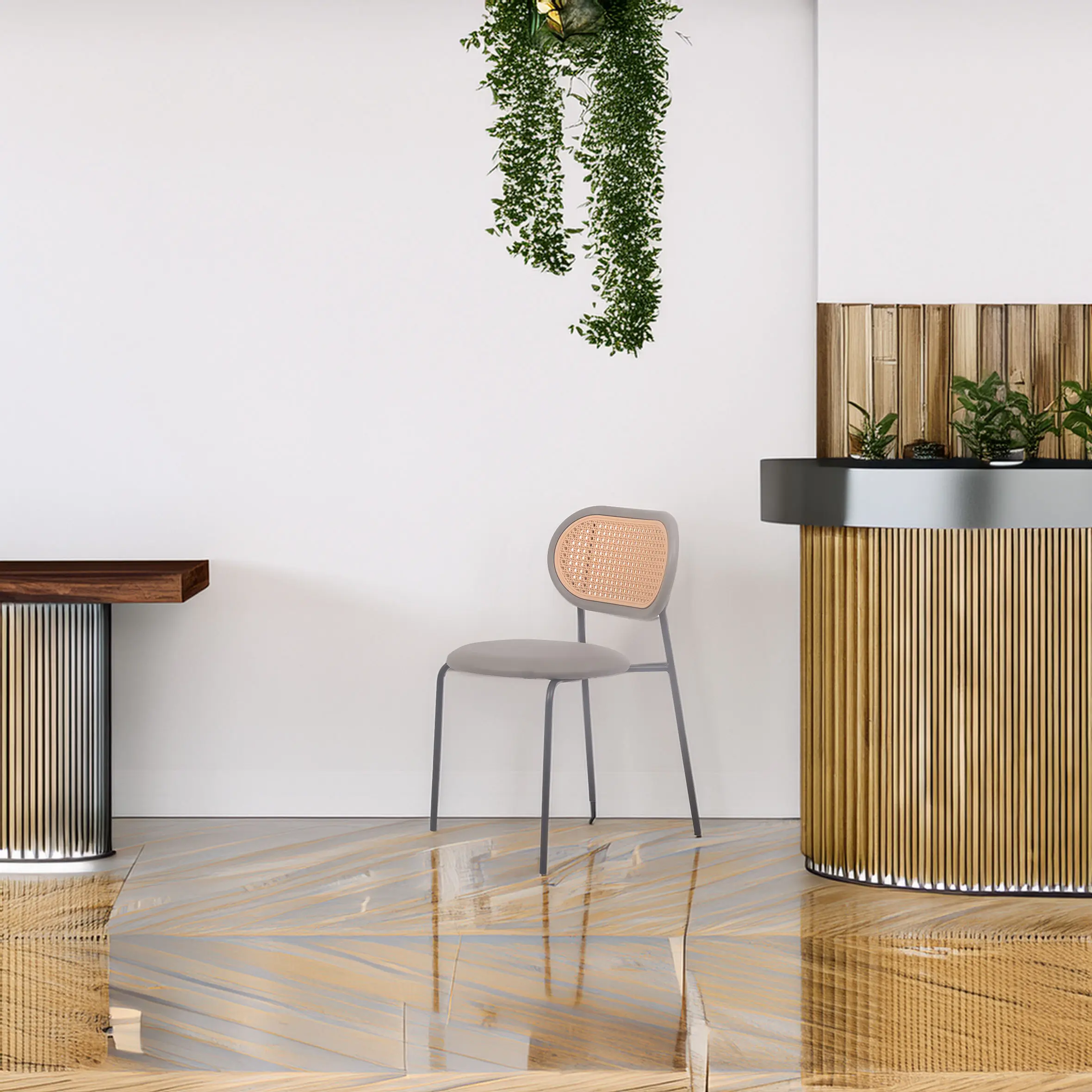 Modern interior with a sleek wooden chair, a minimalist wood and metal table, and a small plant on a textured counter. Hanging greenery adds freshness.