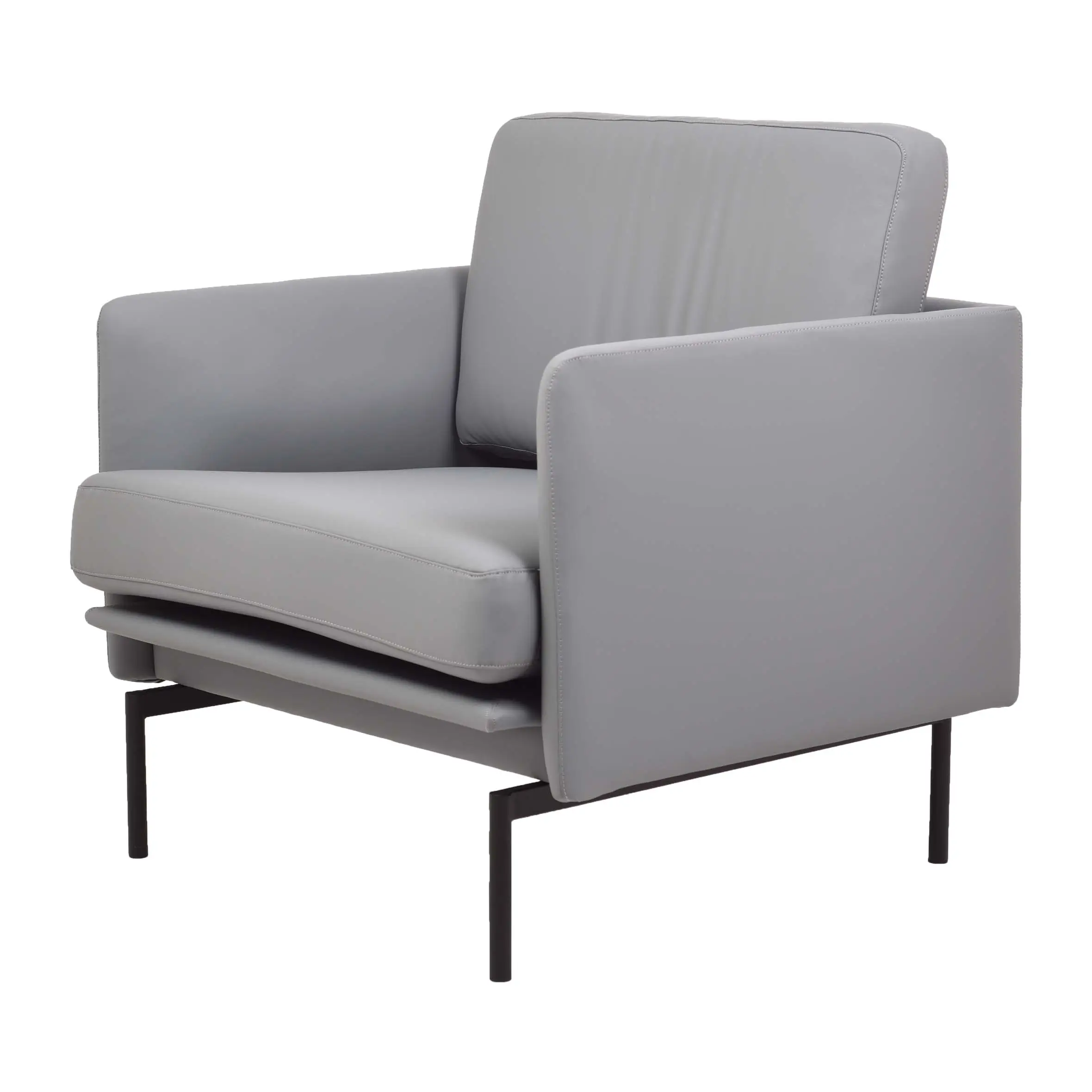 A modern office space featuring a gray armchair against a white wall, wooden paneling, and potted plants. The scene conveys a calm, minimalist vibe.