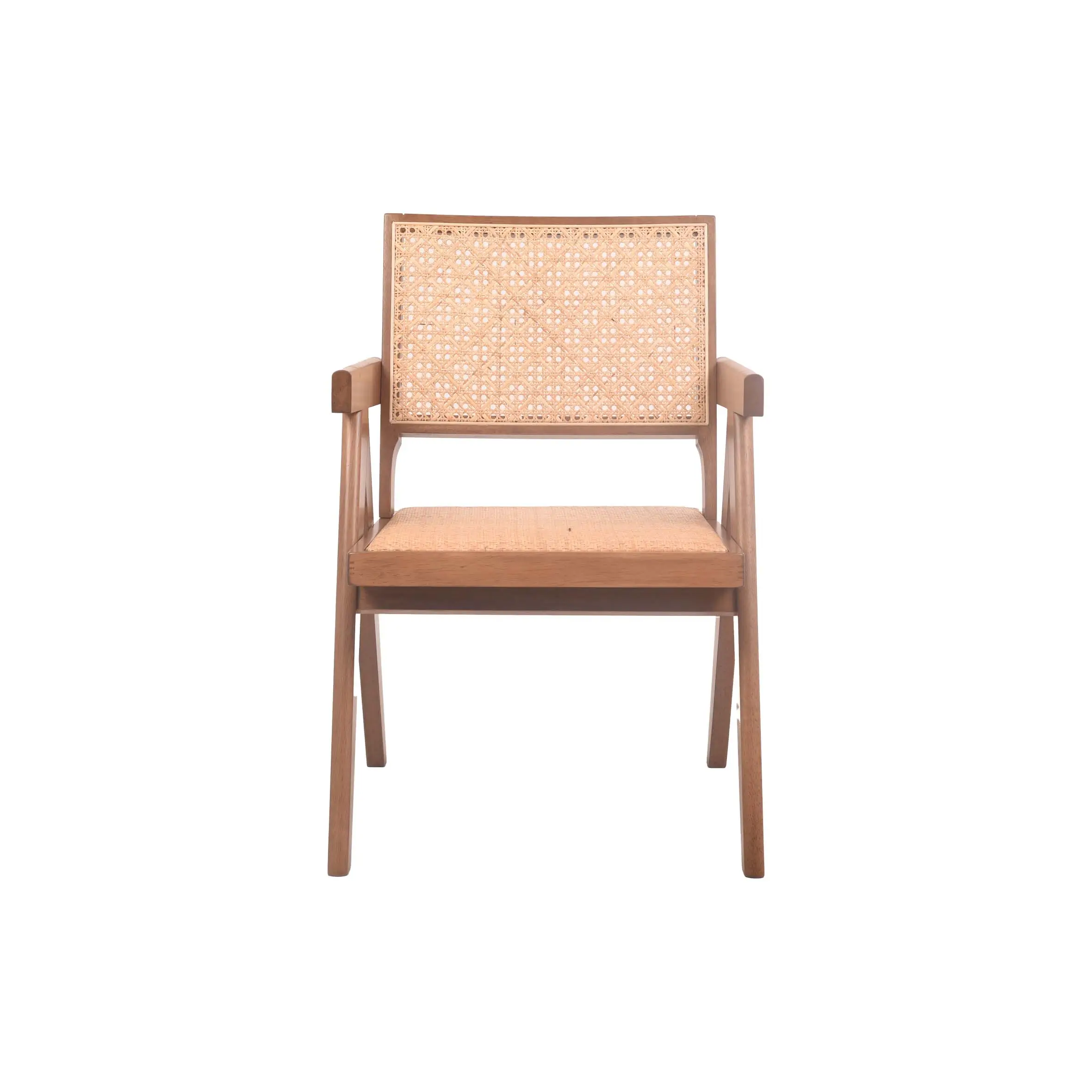 A minimalist room features a wooden chair with woven rattan details beside large windows. Nearby, a lush potted plant adds greenery. The space feels serene.