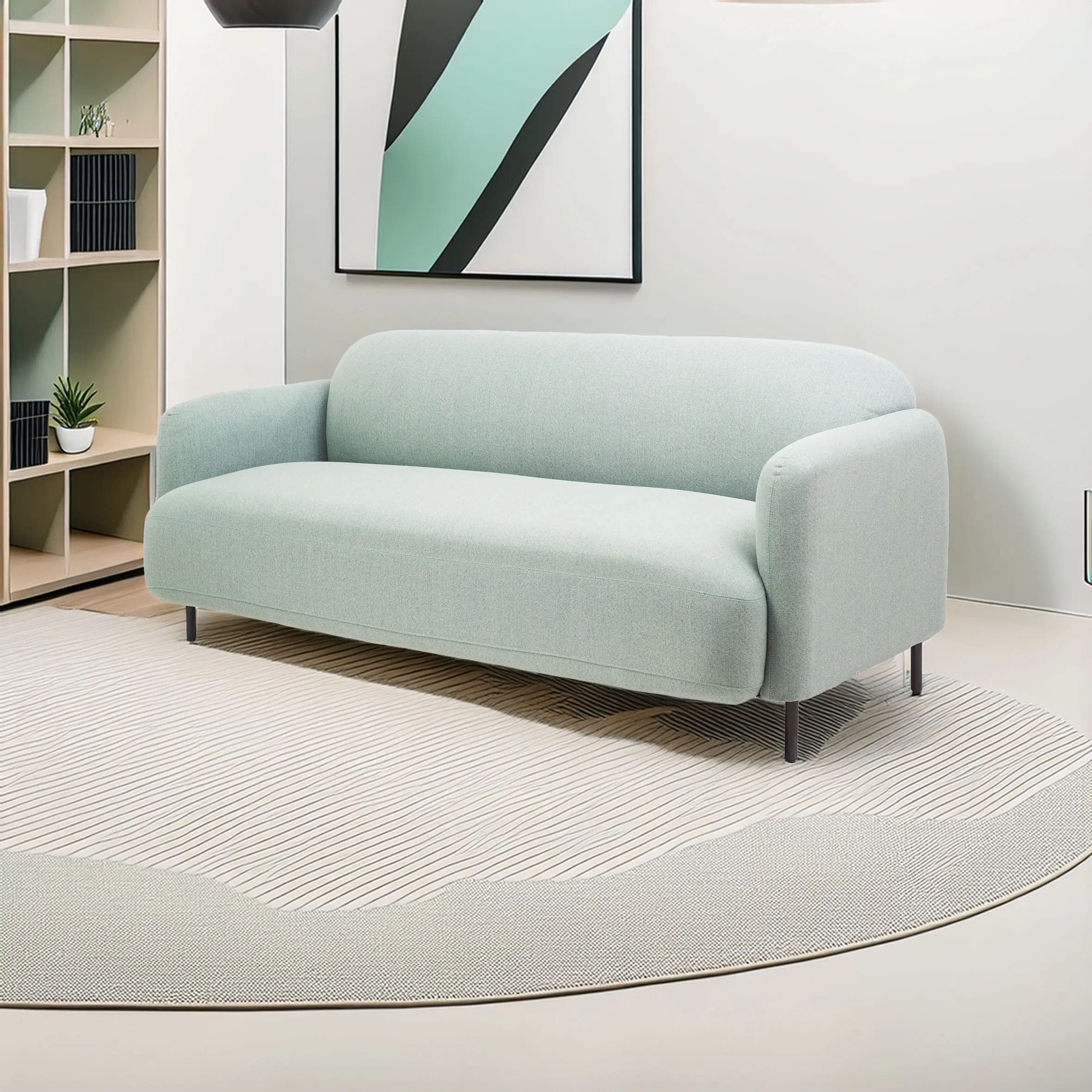 Mint Green sofa in a sleek modern office with large windows, gray rug, plants, and city view. Minimalist and cozy ambiance with a neutral palette.