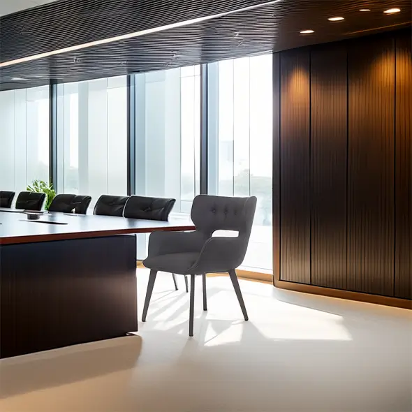 Modern conference room with sleek black chairs, a large wooden table, and floor-to-ceiling windows. Soft lighting creates a professional tone.