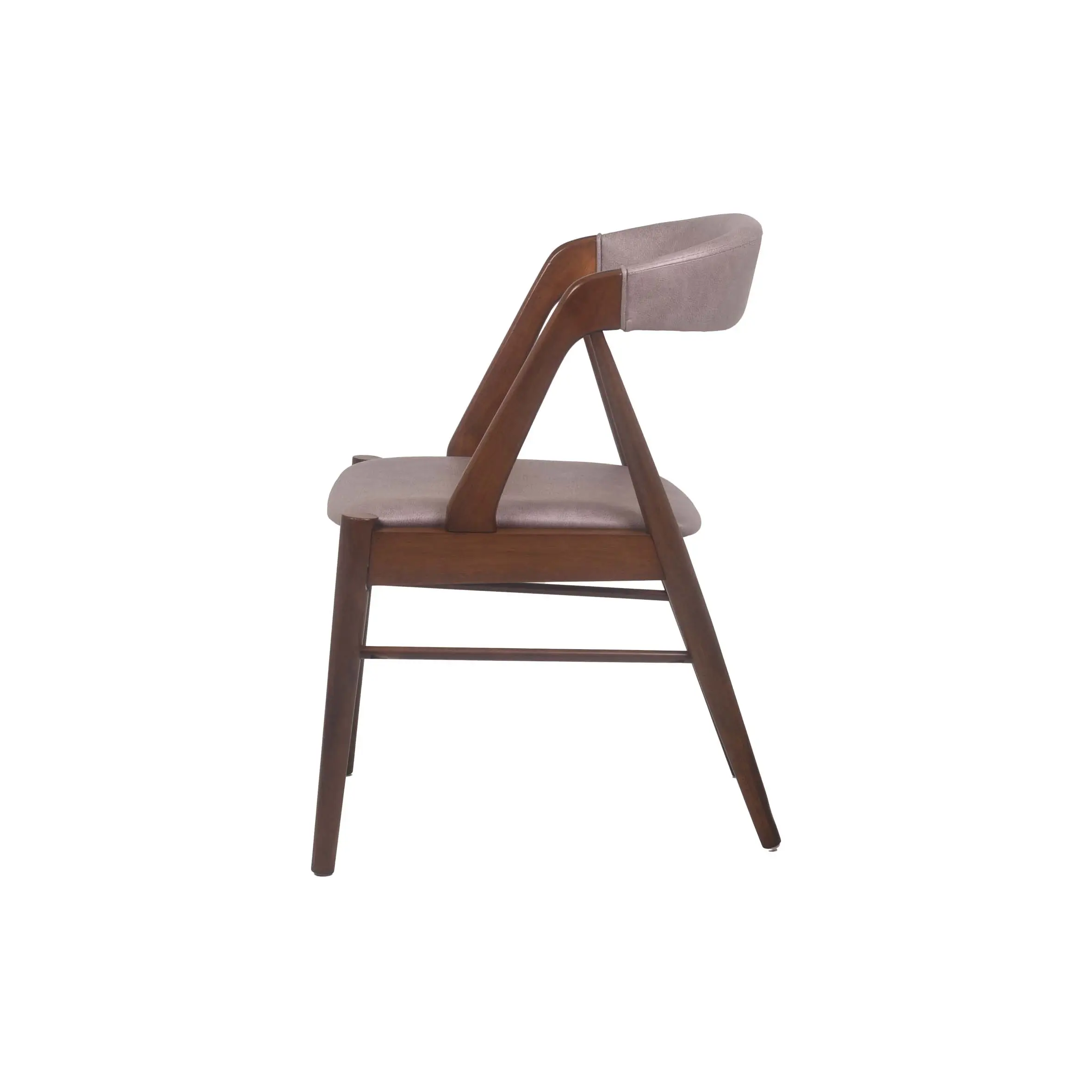 A modern conference room with wooden table, elegant chairs, and pendant lights. Floor-to-ceiling glass windows provide ample natural light, conveying a sleek and professional atmosphere.