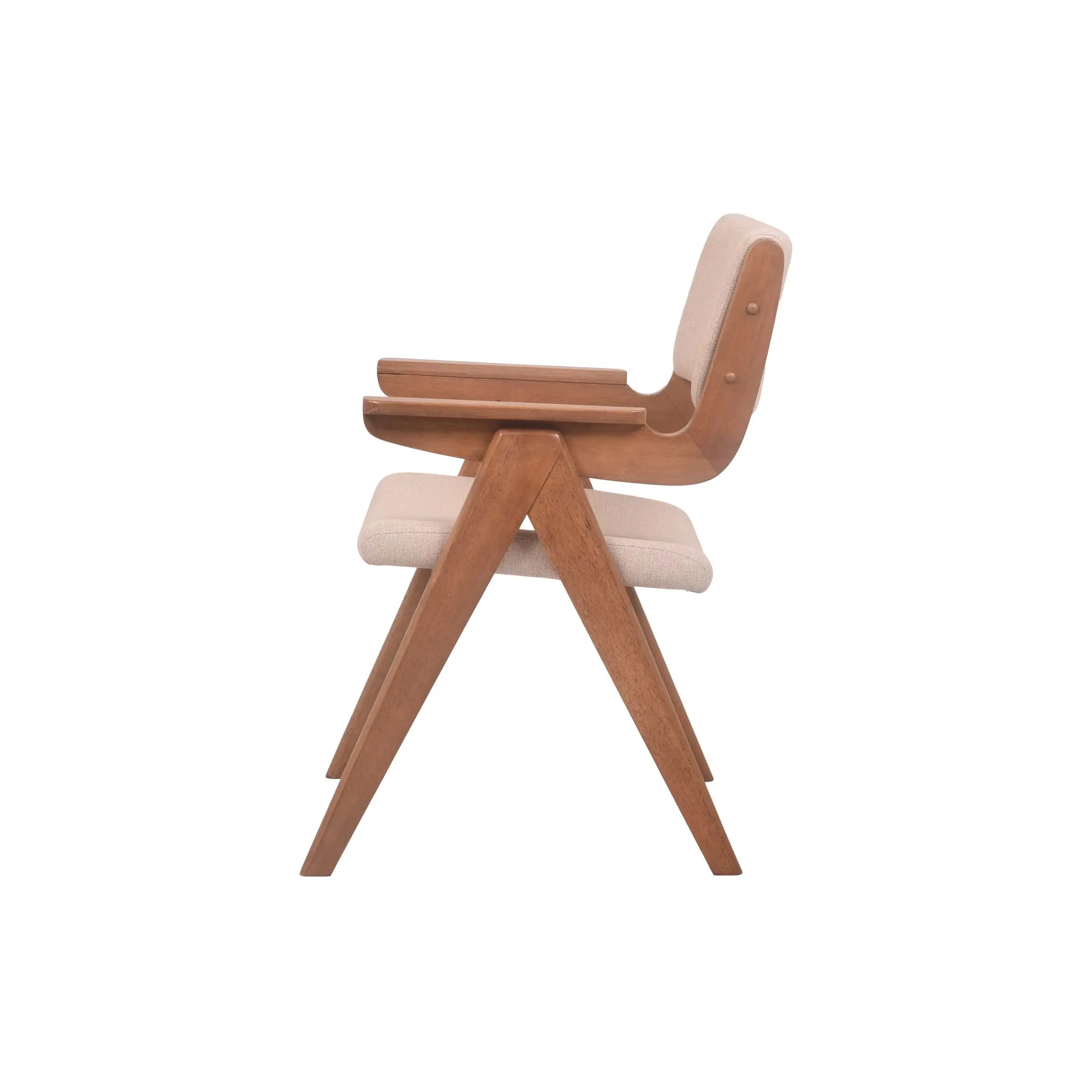 Modern office with large windows, wooden desk, and cushioned chair on a striped rug. Bookshelf with decor, plants, and files adds an organized feel.