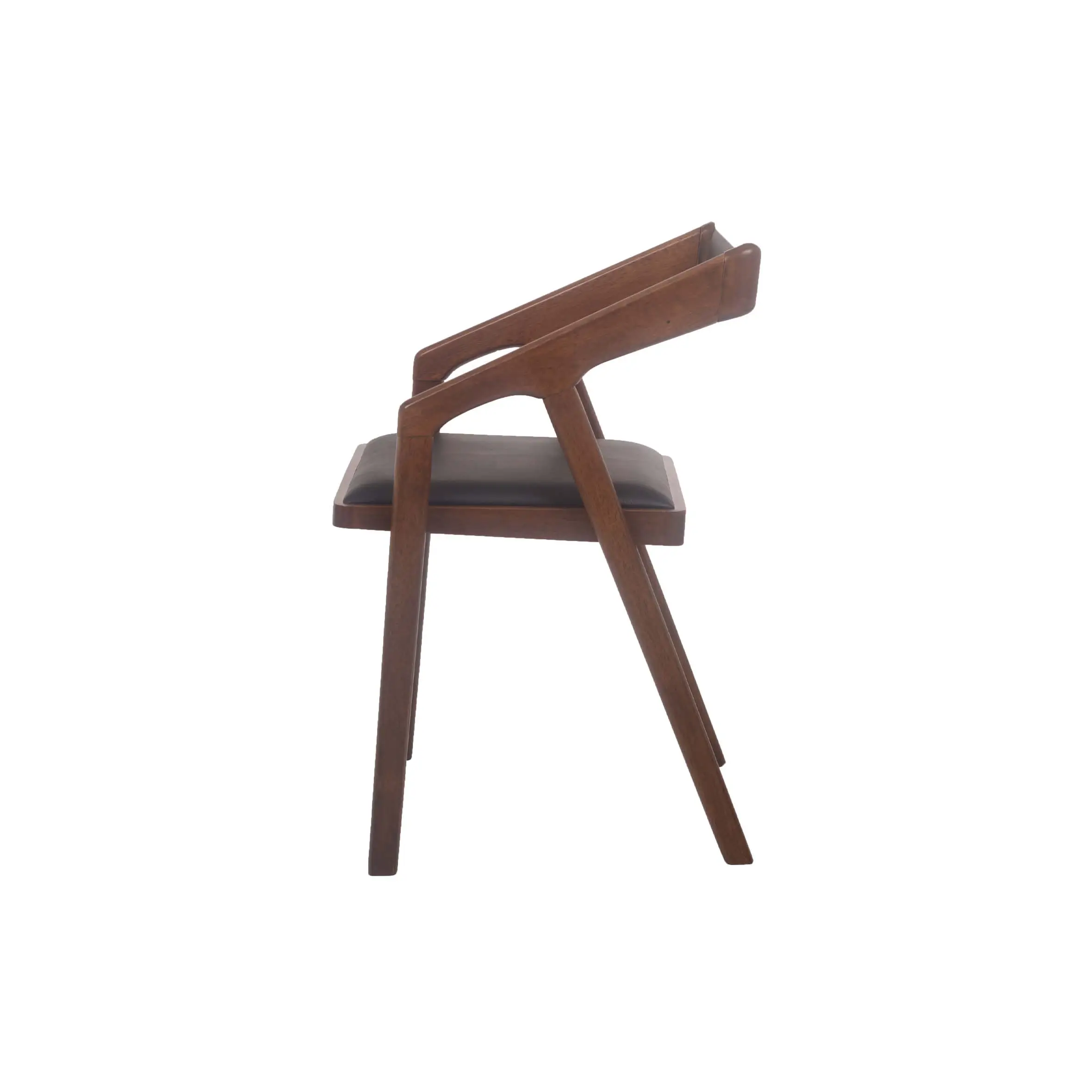 A modern wooden chair with a black cushion sits on polished wooden floors in a bright room, alongside a wooden desk and shelves, evoking a sleek, minimalist design.