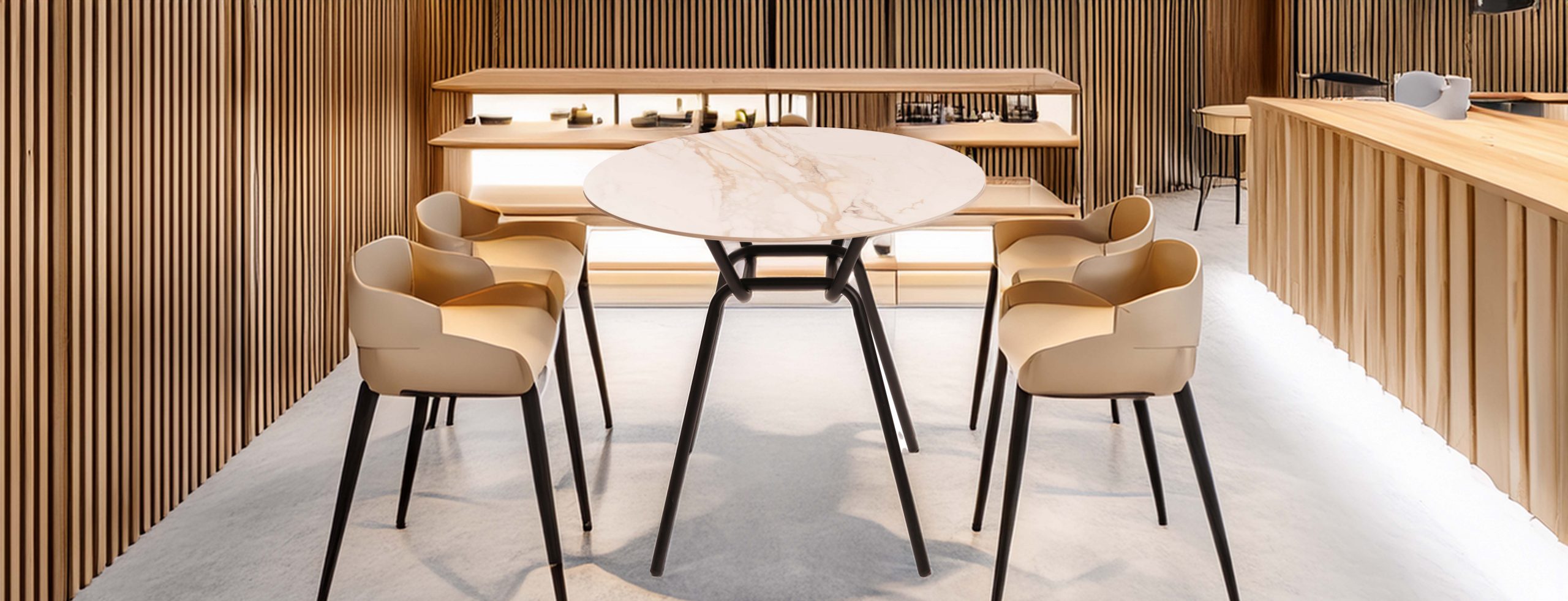 A modern cafeteria with a round marble table, tan chairs, and wooden accents. Cozy ambiance.