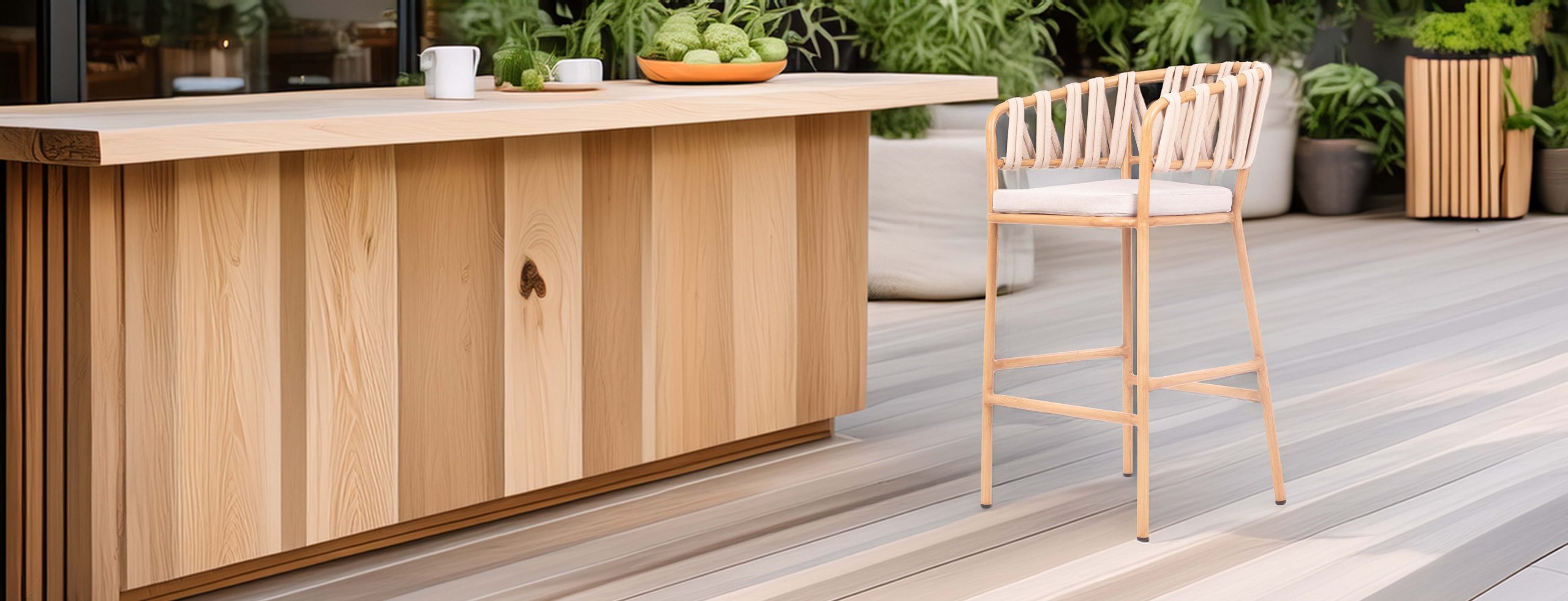 Outdoor patio with light wood bar counter, modern woven high chair, and lush green plants.