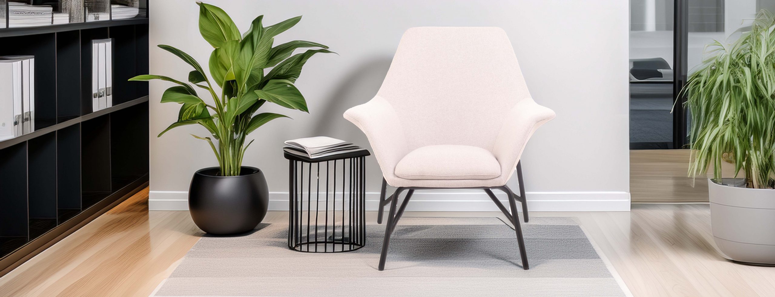 Stylish white armchair beside a black side table with books and a green potted plant, creating a modern, inviting lounge space. Elegant reflections.