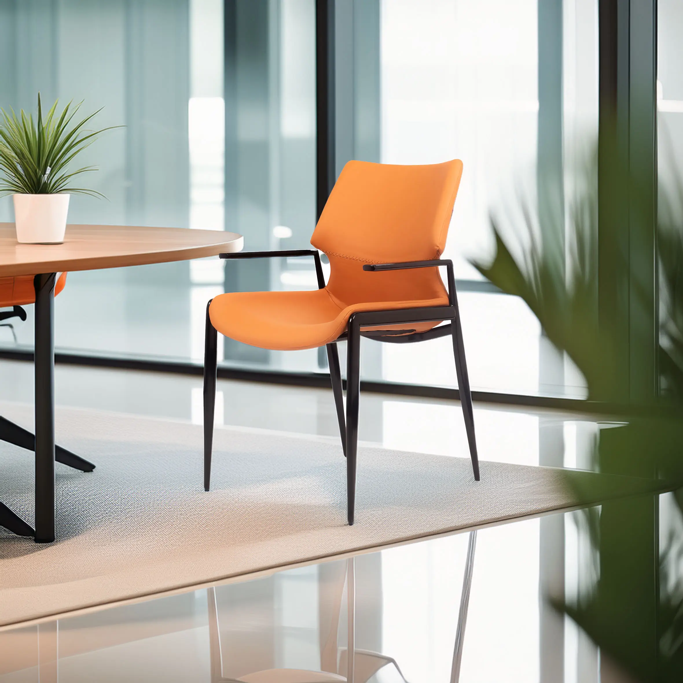 Modern office chair with an orange seat and backrest in a bright room with large windows. A small potted plant sits on the nearby wooden table.