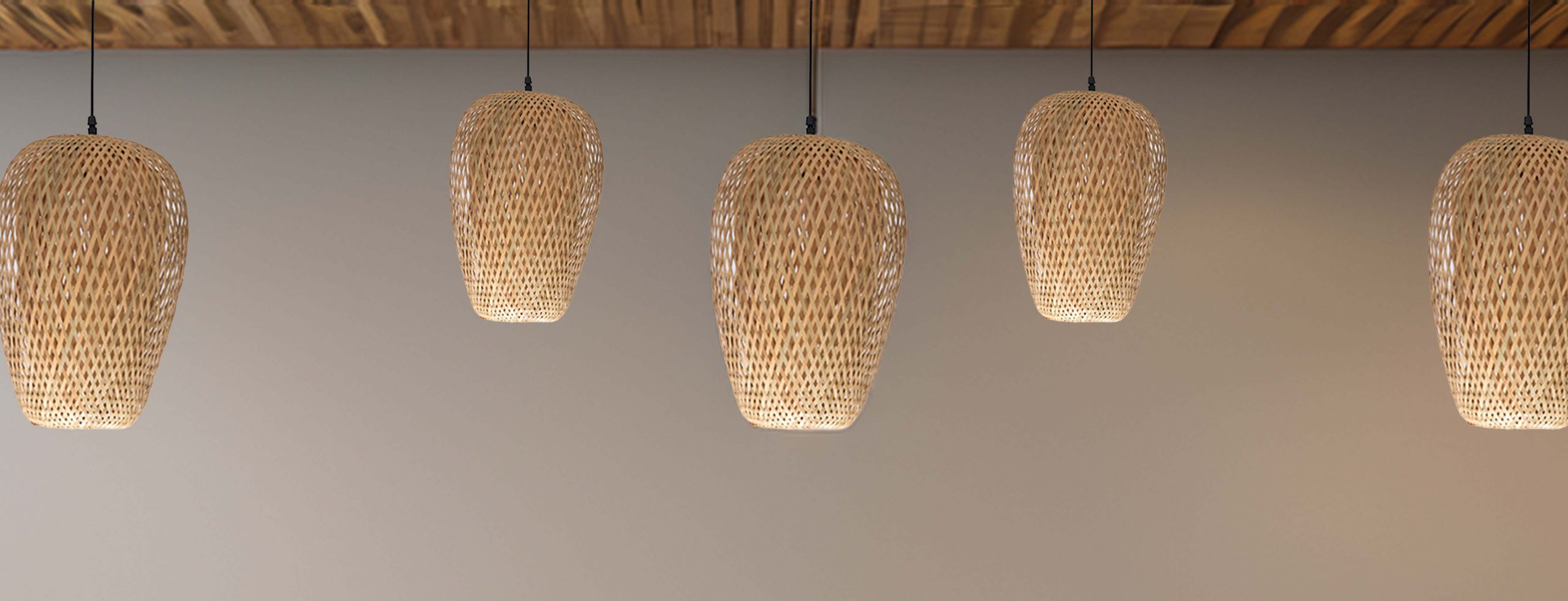 Rattan pendant lights hang from the ceiling, creating a warm ambiance.