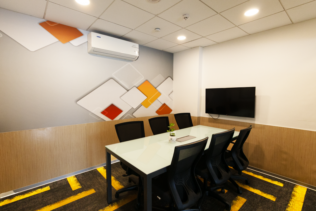 Coworking spaces within managed office spaces environment